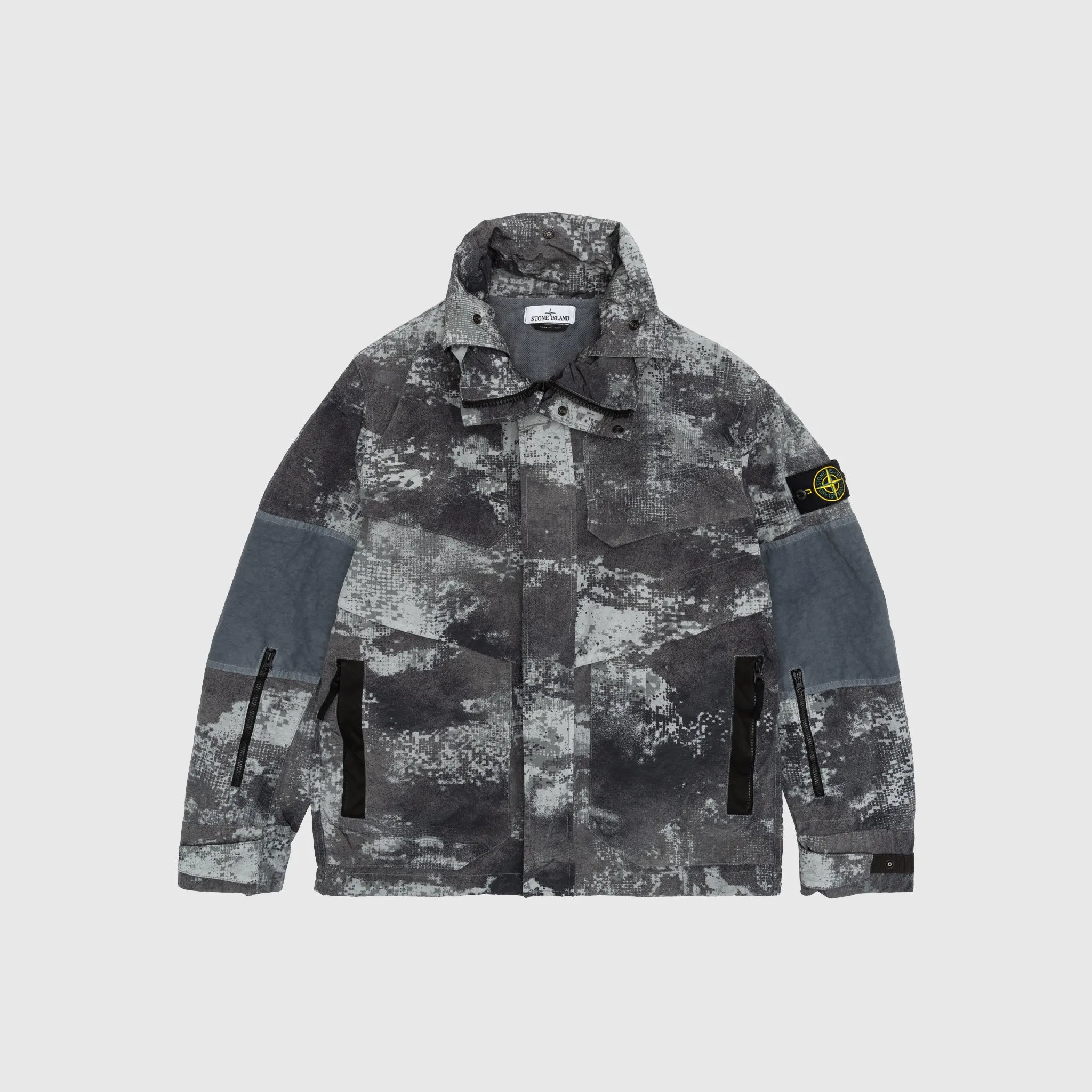 DISSOLVING GRID CAMO IN ECONYL® REGENERATED NYLON JACKET